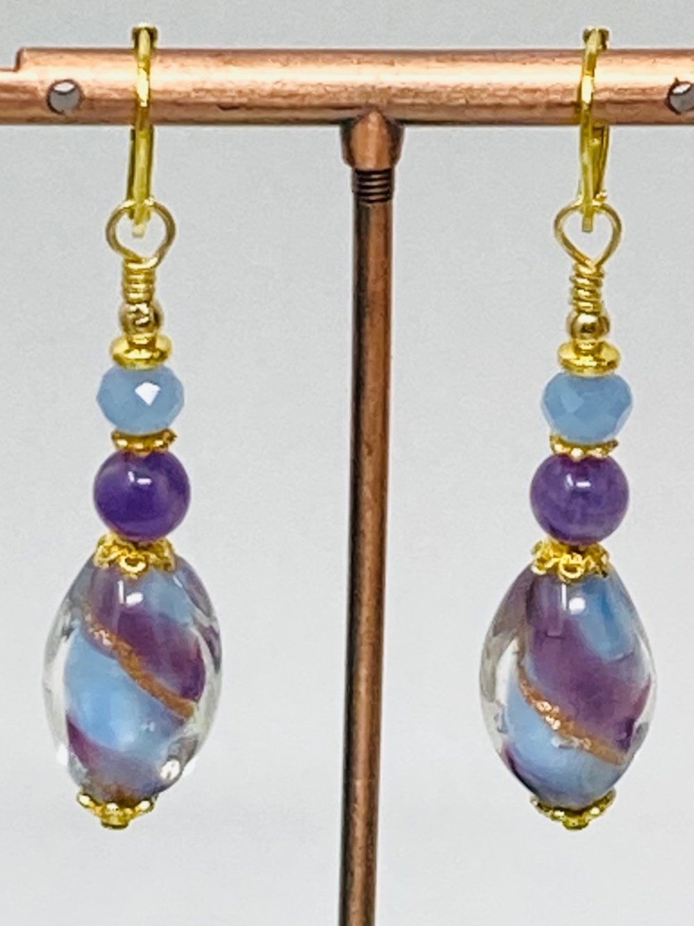 Amethyst & Glass Earnings